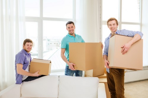 Packed moving boxes and relocation equipment for Chelsea removals