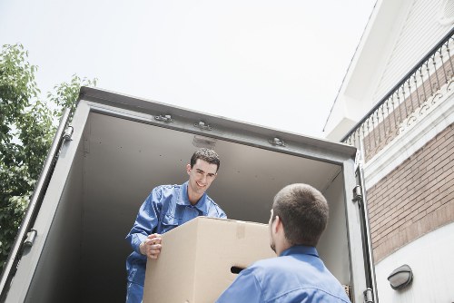 Moving van near elegant Chelsea townhouses